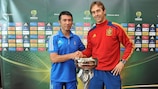 Greece coach Kostas Tsanas (left) and Julen Lopetegui of Spain with the trophy
