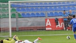 Cyprus's Nikos Englezou scores the opening goal
