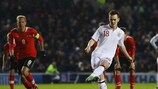 Josh McEachran strokes in England's second from the penalty spot