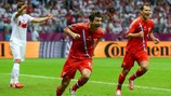 Alan Dzagoev festeja um golo frente à Polónia, co-anfitriã do UEFA EURO 2012