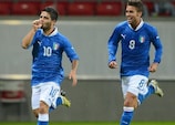 Lorenzo Insigne (left) celebrates scoring in the play-off against Sweden