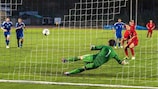 Gheorghe Anton of Moldova scores their second goal from the penalty spot