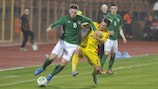 Ireland's Matthew Doherty (left) is tackled by Claudiu Bumba
