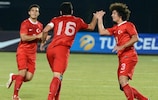 Turkey captain Musa Çağıran (No16) enjoys his goal with Oğuzhan Berber