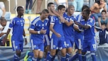 Munas Dabbur (centre) is congratulated by his Israel team-mates