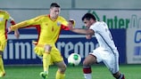 Romania's Alexandru Dan squares up to Germany's Özkan Yıldırım