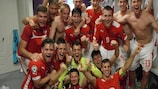 Austria celebrate a comfortable victory in their dressing room