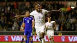 Saido Berahino wheels away after scoring a late penalty to earn England victory
