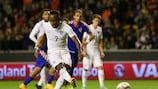 Saido Berahino scores a penalty in the first leg of England's play-off tie against Croatia