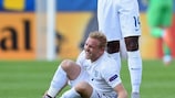 Alex Pritchard feels the pain during England's win against Sweden