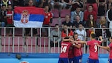 Serbia celebrate their goal against Germany in Prague on matchday one