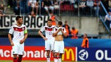 Os jogadores da Alemanha mostram a sua desilusão durante a derrota com Portugal