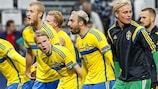 Oscar Lewicki leads Sweden's celebrations earlier in the tournament