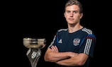 Russia captain Anton Mitryushkin with the trophy
