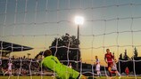 Russia goalkeeper Anton Mitryushkin makes a save against Spain