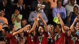 Spain celebrate with the trophy in Greece