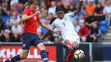 Marcus Rashford scores the first of his three against Norway