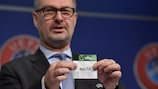 UEFA head of national team competitions Lance Kelly conducts the draw