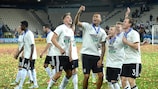 Germany's players relish the occasion on the pitch after full time