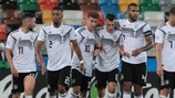 Luca Waldschmidt (No10) is congratulated after scoring Germany's third goal on matchday one