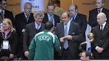 Massimo Cumbo shakes hands with UEFA president Michel Platini after the final