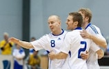 Lasse Lind (left) celebrates one of his two goals for Finland