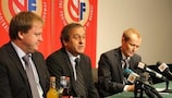 The Football Association of Norway (NFF) president Yngve Hallén, UEFA President Michel Platini and NFF communications official Svein Graff take part in a media conference
