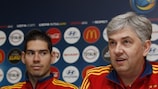 Spain coach José Venancio López (right) gives his thoughts as Kike looks on