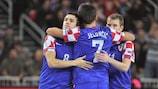 Darko Marinović (left) is congratulated after the first of his two goals against Russia