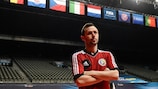 Romania captain Robert Lupu poses at the side of the Sportpaleis pitch