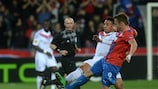 Corentin Tolisso challenges Plzeň goalscorer - and penalty misser - Stanislav Tecl