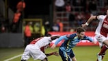 Kevin Gameiro (centre) tries to create an opening in Liege