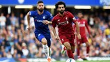 LONDON, ENGLAND - SEPTEMBER 29: Mohamed Salah of Liverpool runs with the ball away from Olivier Giroud of Chelsea during the Premier League match between Chelsea FC and Liverpool FC at Stamford Bridge on September 29, 2018 in London, United Kingdom. (Photo by Shaun Botterill/Getty Images)