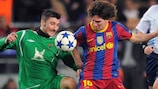 Lionel Messi (FC Barcelona) y Salvatore Bocchetti (FC Rubin Kazan)