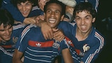Jean Tigana and Alain Giresse celebrate after France beat Spain 2-0 in the final of the 1984 UEFA European Championship
