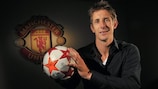 Edwin van der Sar poses with the UEFA Champions League ball