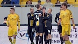 Lokeren's players celebrate their winning goal in Ukraine
