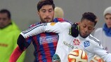 Dynamo's Jeremain Lens shields the ball from Steaua's Paul Papp