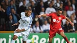 FCK's Mathias Jørgensen looks to keep tabs on Karim Bellarabi of Leverkusen