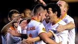 Paco Alcácer (centre) celebrates after putting Valencia 3-0 up on the night