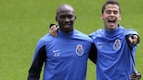 Porto pair Eliaquim Mangala and Diego Reyes share a joke in training on Wednesday