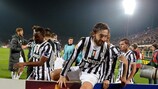 Andrea Pirlo leads the celebrations after Juventus make it to the quarter-finals