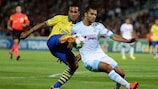 Jérémy Morel vies with Theo Walcott during Marseille's defeat by Arsenal