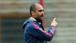 Josep Guardiola instructs his Bayern players during training