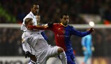 Spurs' Lewis Holtby looks to stop Basel's Mohamed Salah