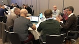 Referee observers in a group discussion at a recent UEFA course in Amsterdam