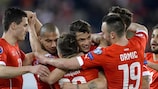 The Swiss team celebrate a goal in UEFA EURO 2016 qualifying