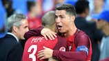 PARIS, FRANCE - JULY 10: Cristiano Ronaldo and Pepe of Portugal celebrate winning at the final whistle during the UEFA EURO 2016 Final match between Portugal and France at Stade de France on July 10, 2016 in Paris, France. (Photo by Laurence Griffiths/Getty Images)