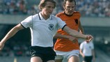Netherlands' Willy van de Kerkhof tracks West Germany's Bernd Schuster at UEFA Euro 1980 