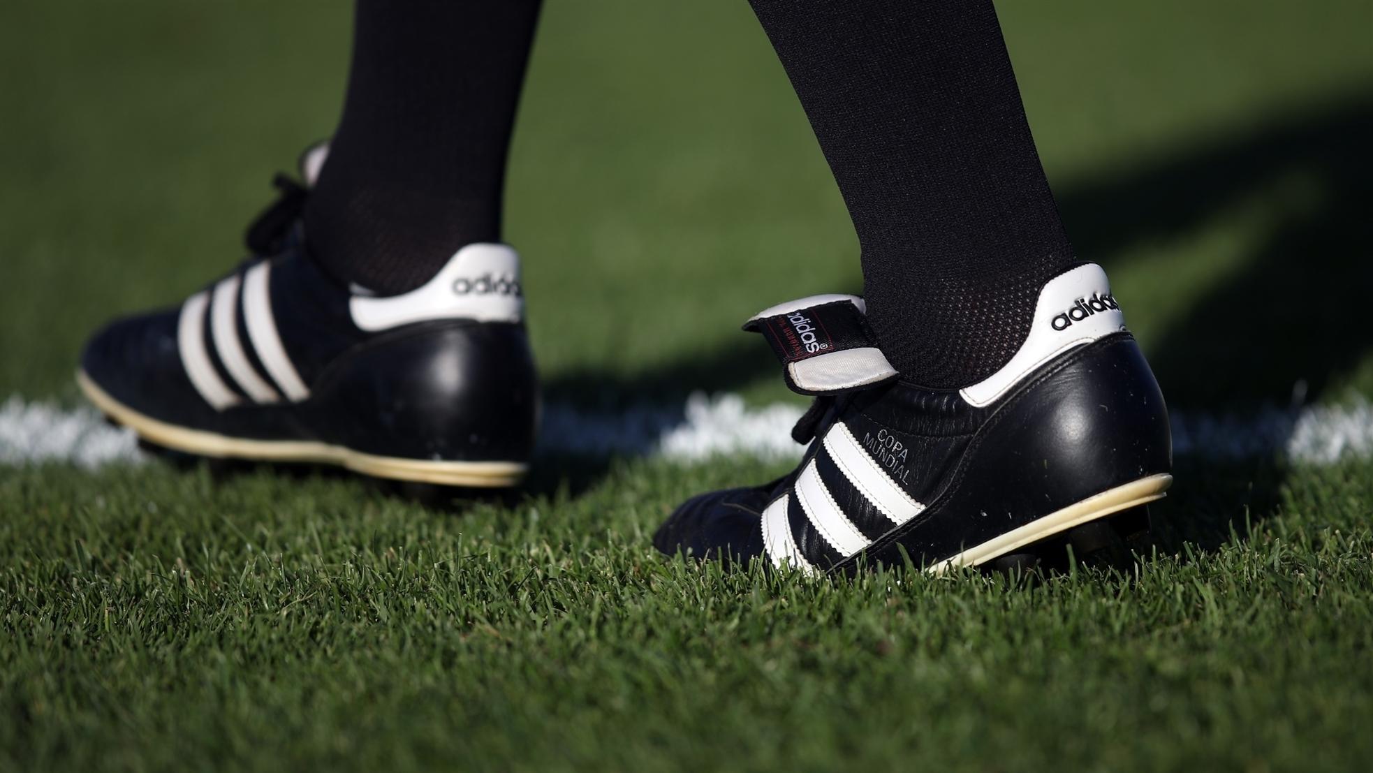 Tools of the trade: the history of the football boot | Inside UEFA ...